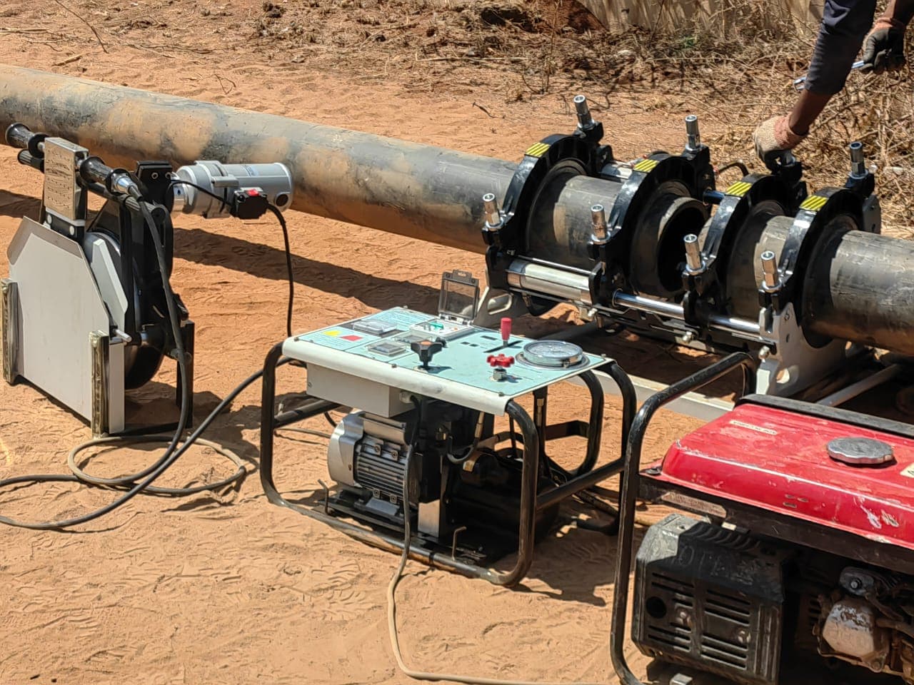HDPE pipe being pulled through a prepared HDD bore